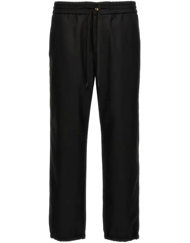 Trousers With Drawstring Waistband And Side Pockets