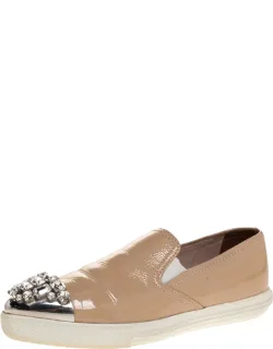 Miu Miu Patent Leather Slip On Sneakers With Crystal Embellishments