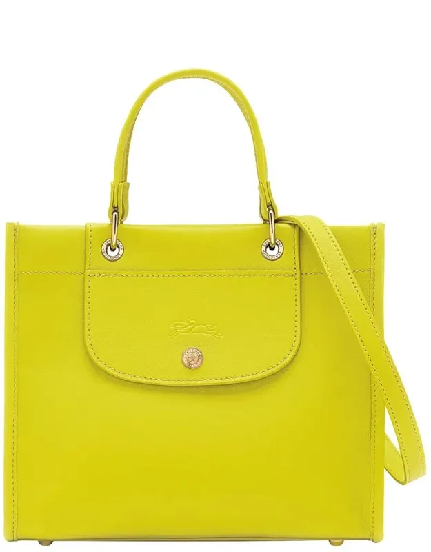 Handbag With Embossed Logo On The Front And Adjustable And Removable Shoulder Strap In Leather