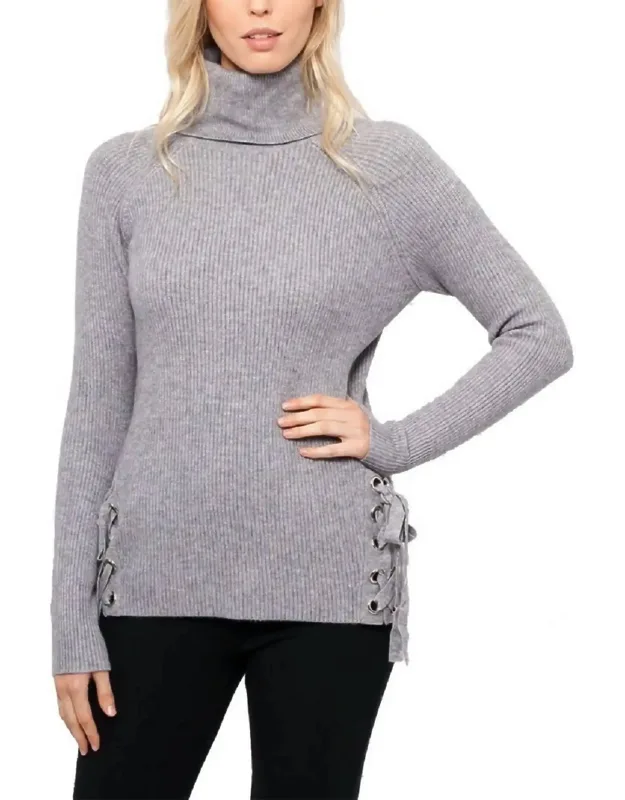 Turtleneck Sweater With Corset-tie Detail And Silver Grommets