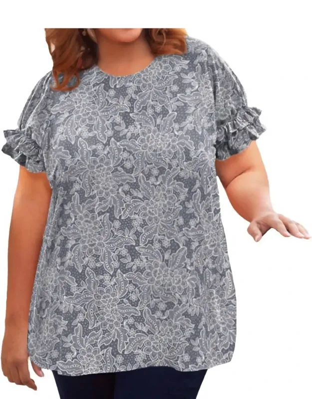 Short Sleeve Ruffle Blouse With Scoop Neckline And Pockets