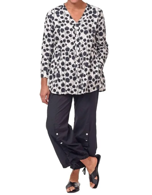 Rosalinda Top With Side Seam Pockets And Ruffle Detail