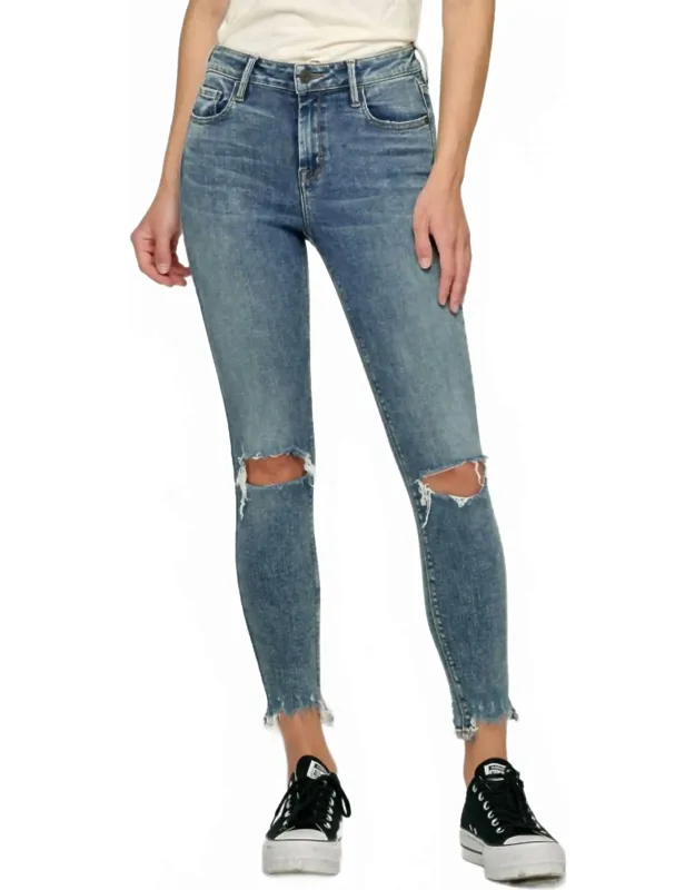 Chewed Hem Distressed Skinny Jeans