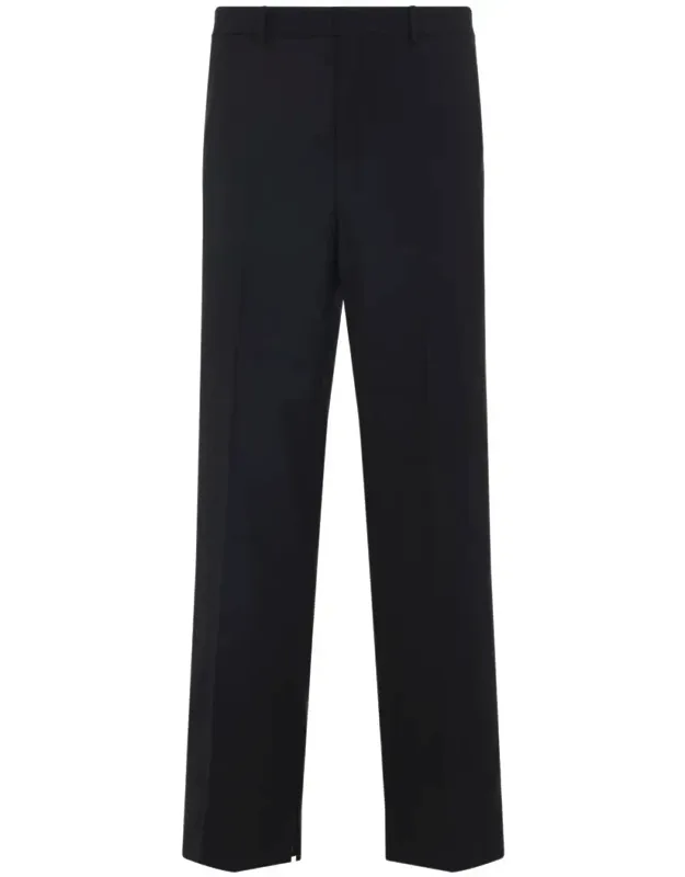 Pants With Zipped Fastening And Side Pockets