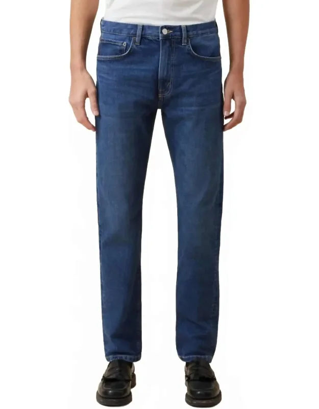 Mid Rise Tapered Denim Jeans