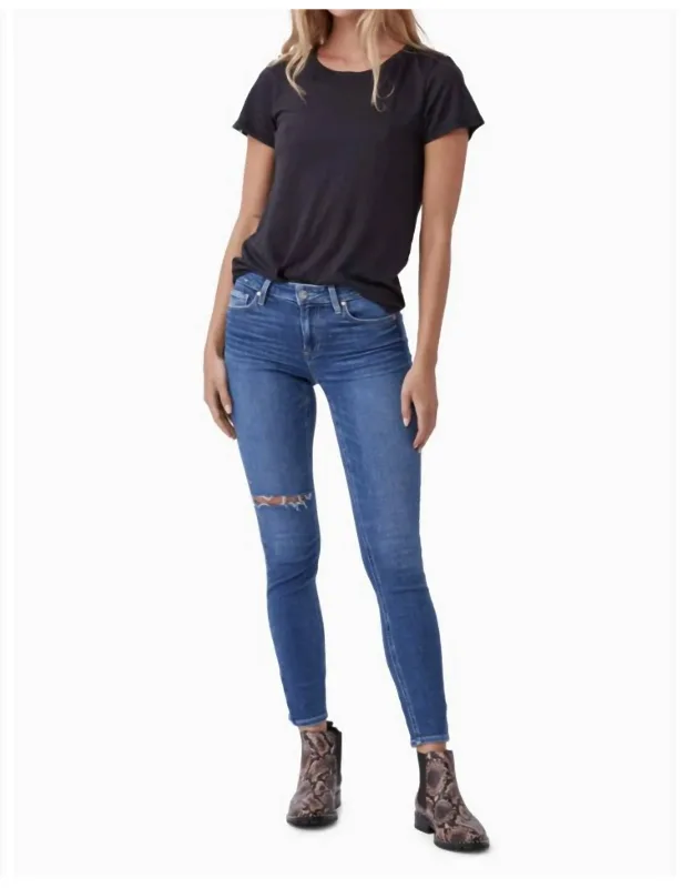 Ripped Ankle Skinny Jeans