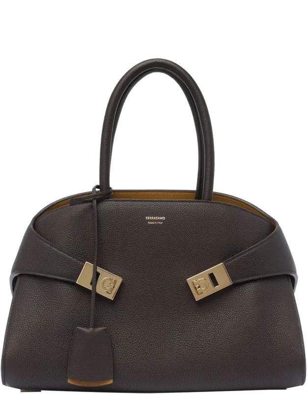 Hug Handbag With 2 Inner Slots And Adaptable Strap