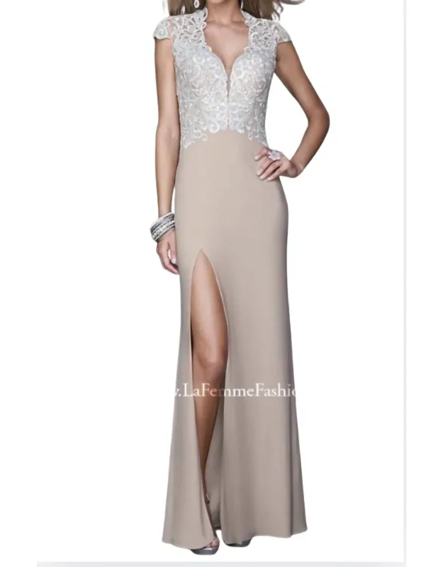 Jersey Dress With An Elegant Embroidered Bodice And Sheer Cap Sleeves.