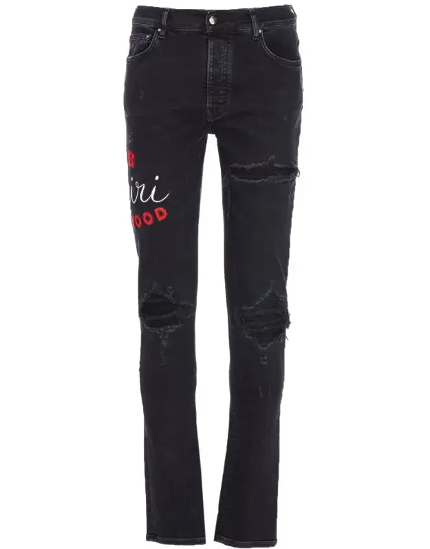 Amiri Jeans With Buttons Closure And Distressed Details