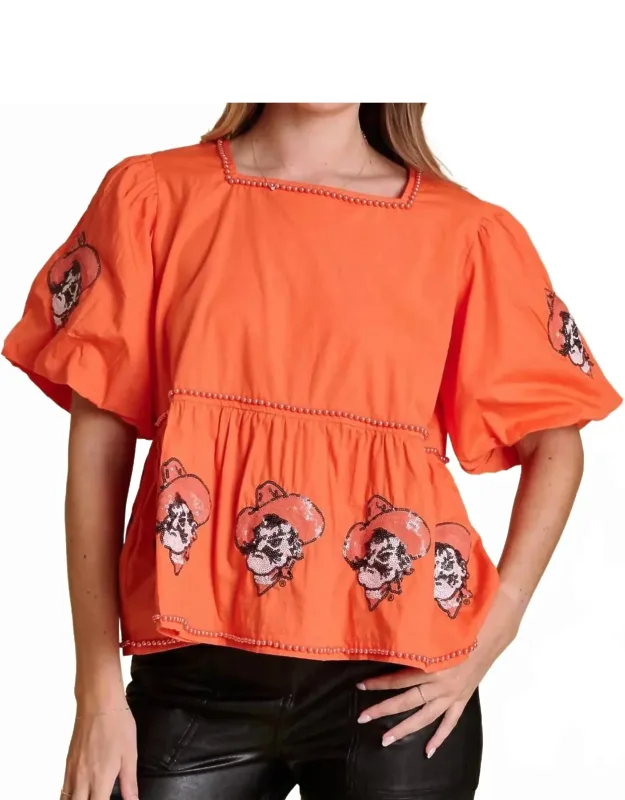The Puff Sleeve Peplum Top