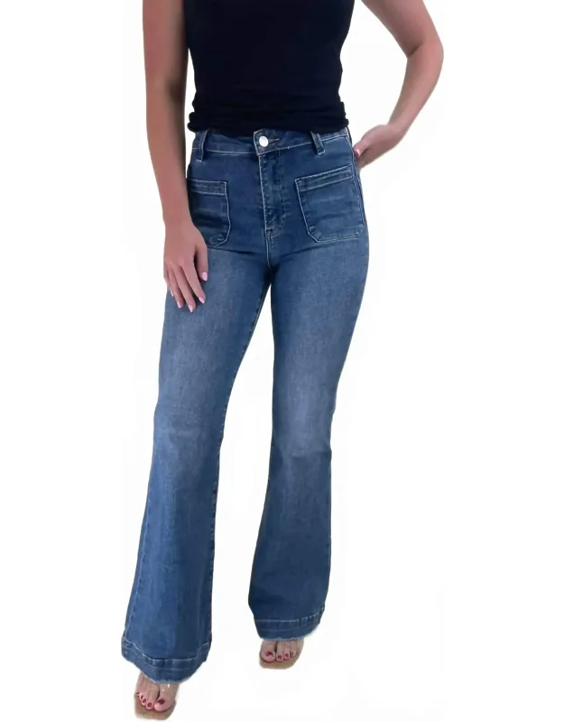 High Rise Patched Pocket Flare Jeans