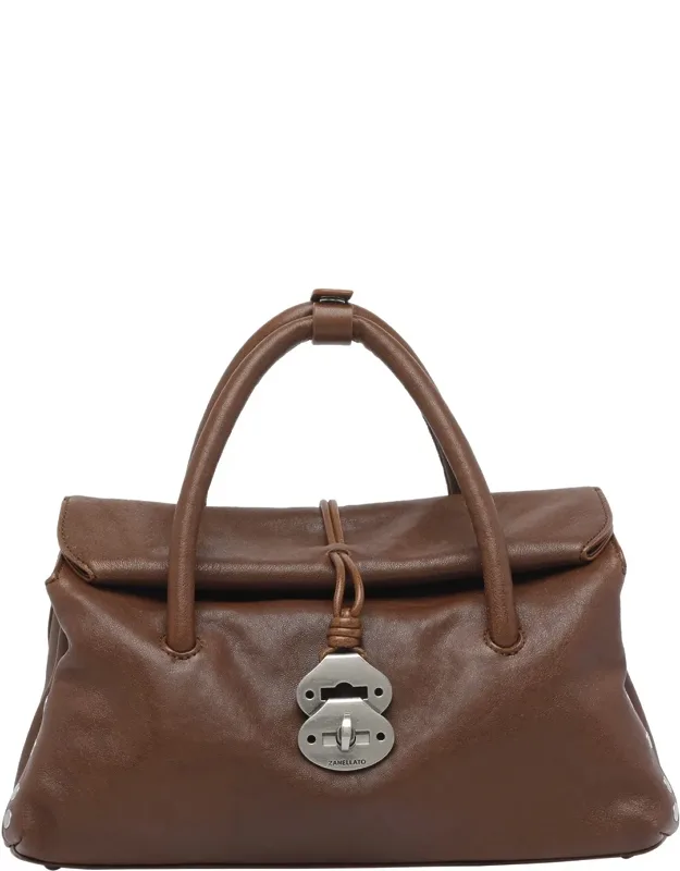Handbag With Magnetic And Turn Lock Closure And 2 Handles