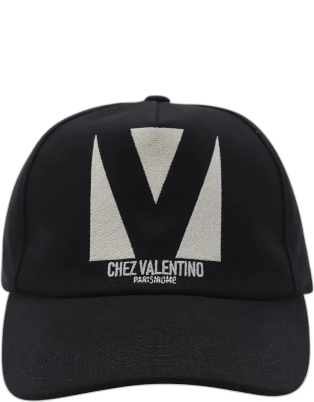 Black And Beige Hat With Round Trim And Frontal Logo