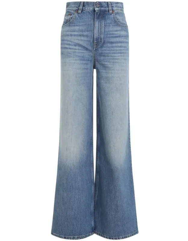 Jeans With Flared Leg And Five Pockets Design