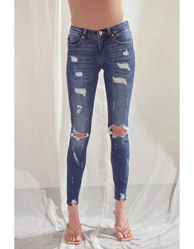 Mid-rise Distressed Super Skinny Jeans