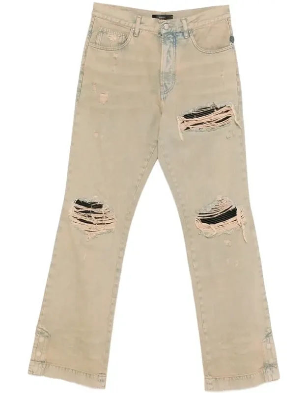 Jeans With Ripped Details And Whiskered Effect