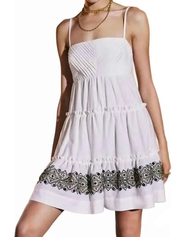 Dress With Embroidered Hem