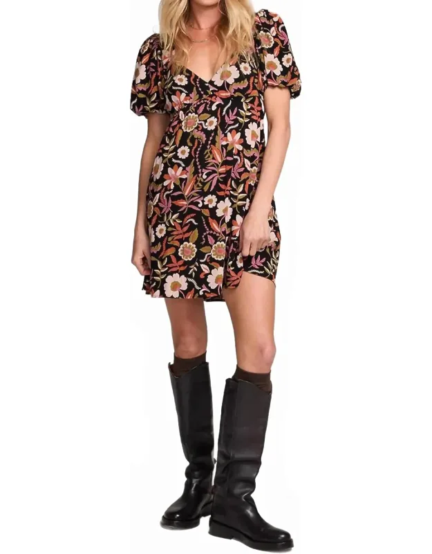 Breelyn Mini Dress With Oversized Floral Fabric And Open Geometric V-neckline