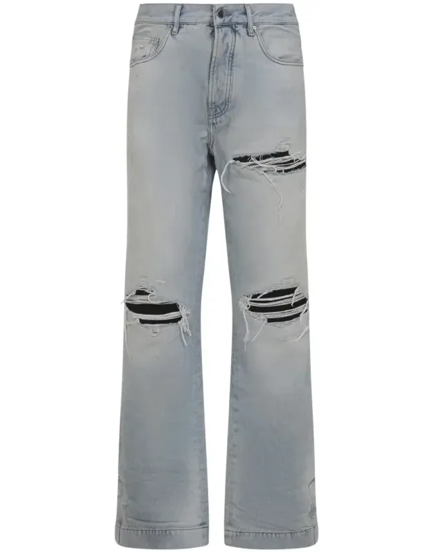 Jeans With Flare Legs And Torn Details
