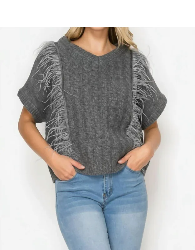Knitted Sweater With Feathers