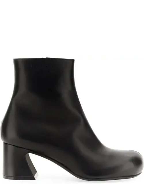 Tassel Ankle Boot With Sculptural Block Heel And Rubber Sole