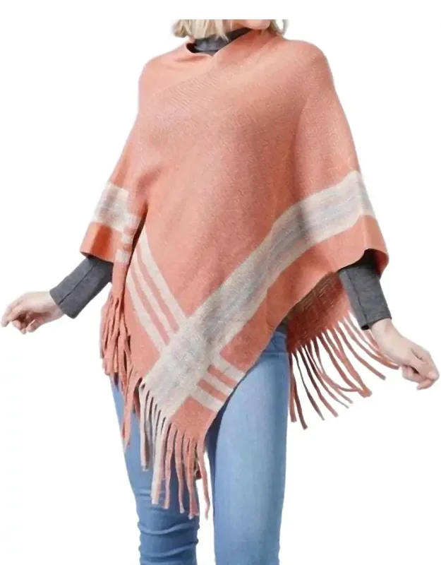 Knit Poncho With Contrast Detail And Tassel Fringe
