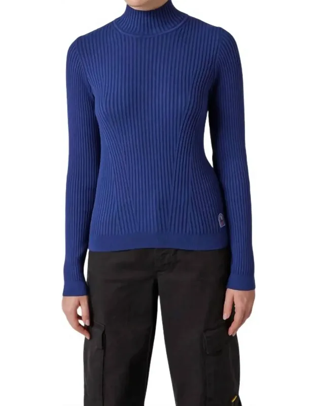 Lotus Turtleneck Sweater
