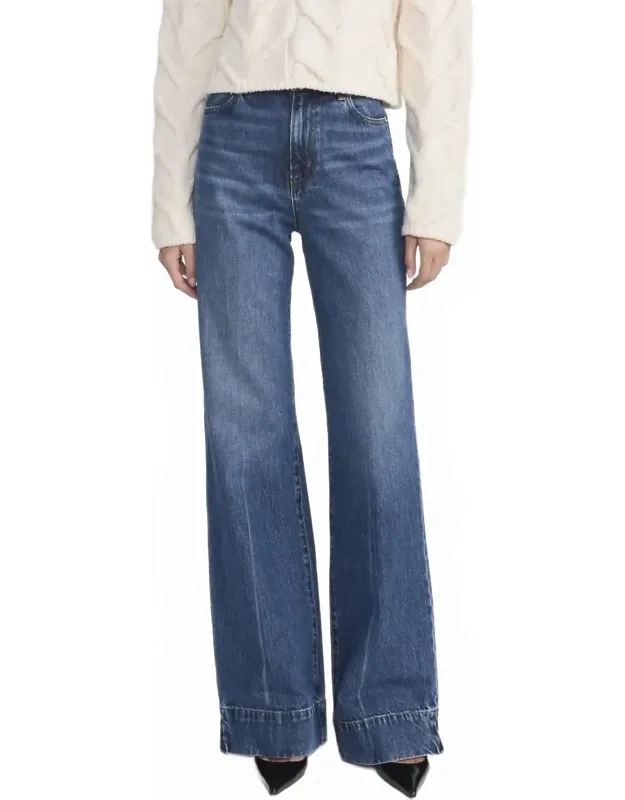 Slice Flare Jeans With High-rise Waist And Side Slit