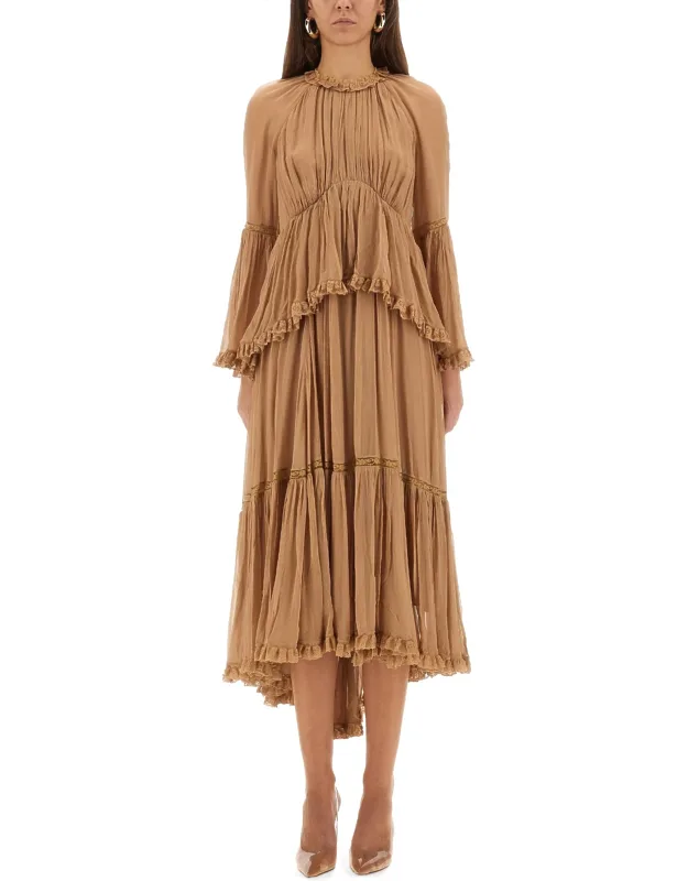 Hypnotic Peplum Ruffle Dress