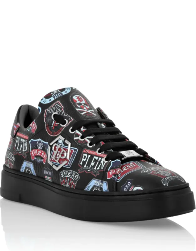 Lo-top Sneakers With Vibrant Patches And Metal Logo
