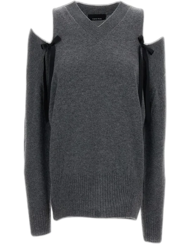 Cashmere Sweater With A V-neck And Bows.