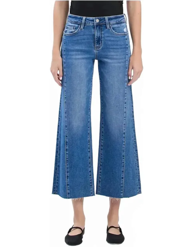High Rise Raw Hem Twist Wide Jeans