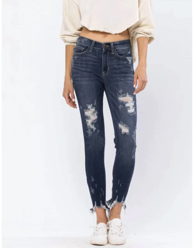 Mid Rise Destroyed Skinny Jeans