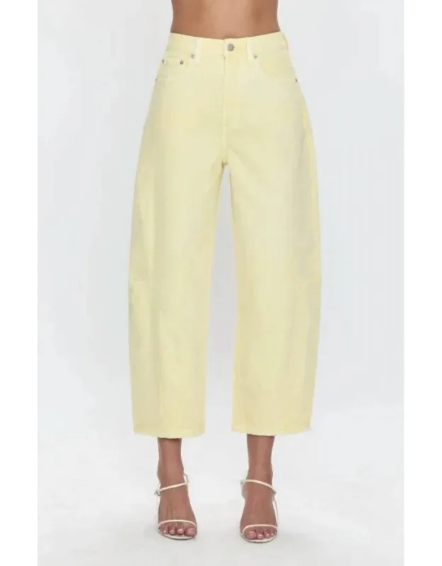 Rigid High Rise Arched Leg Jeans