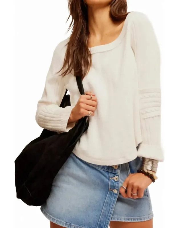 Swinging Cable Cuff Long Sleeve Top