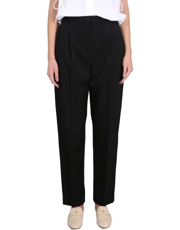 Pants With Concealed Closure And Pockets
